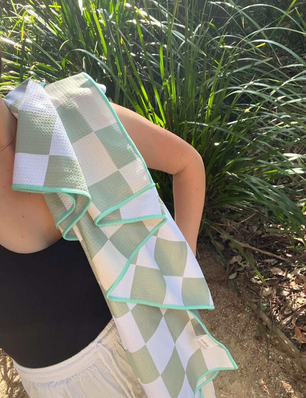 27 Beach towel being showcased by model