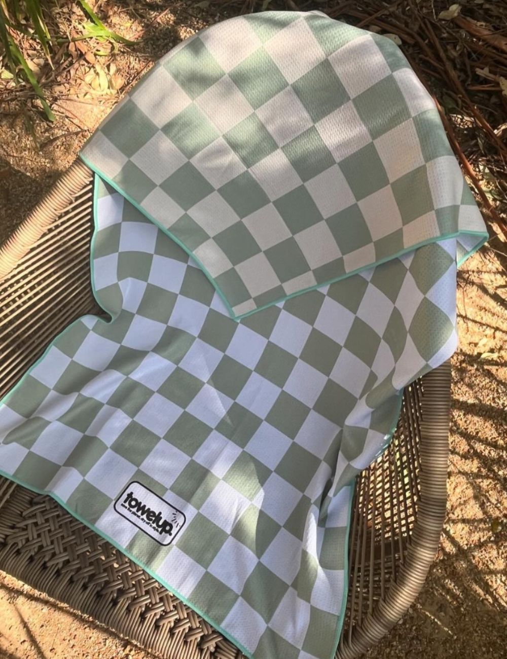 28 Sage Beach towel on a chair