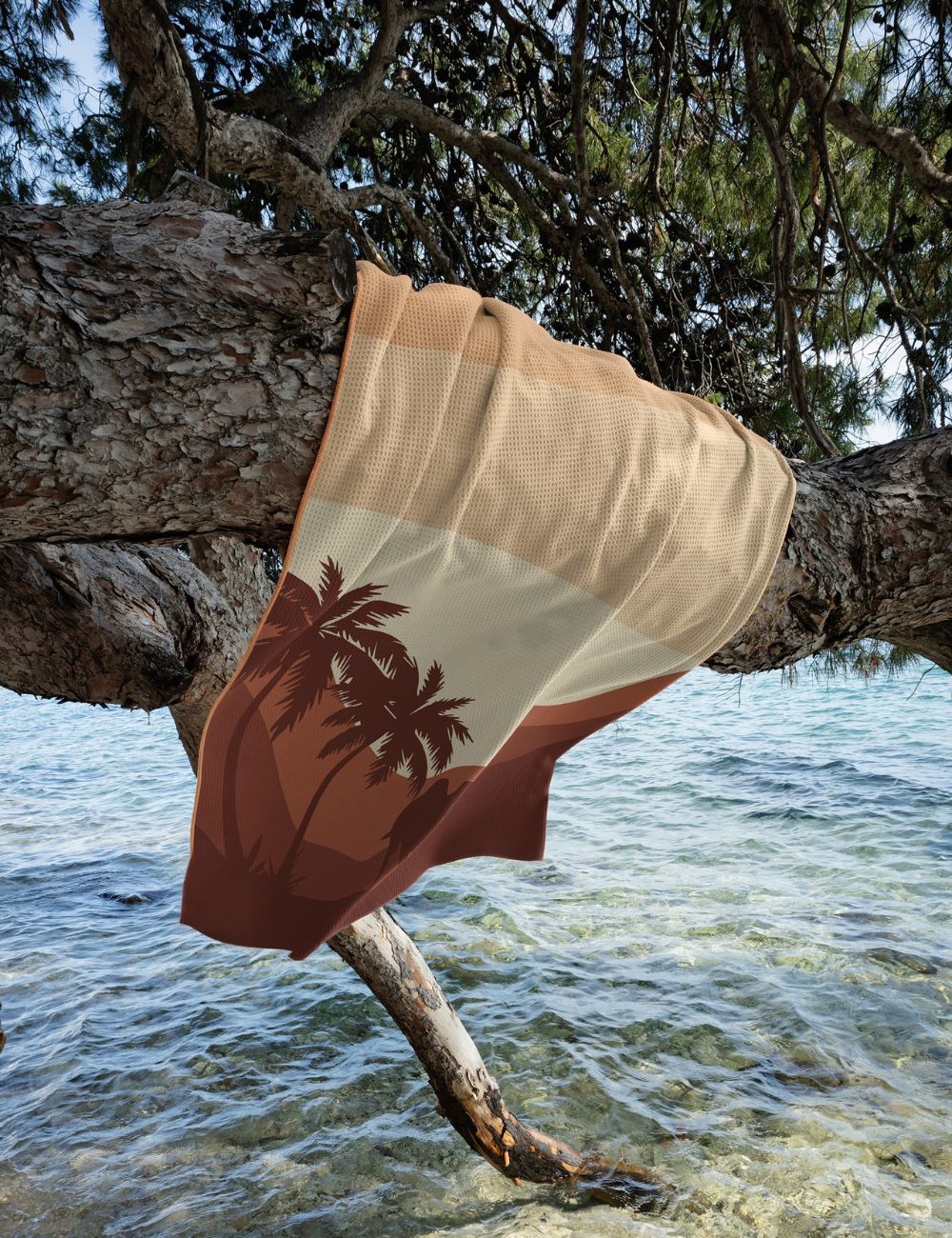 48 Beach towel hanging on a tree by the sea
