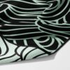 Swell Mint unisex gym towel – white background, zoomed in bottom right, corner folded to show reverse