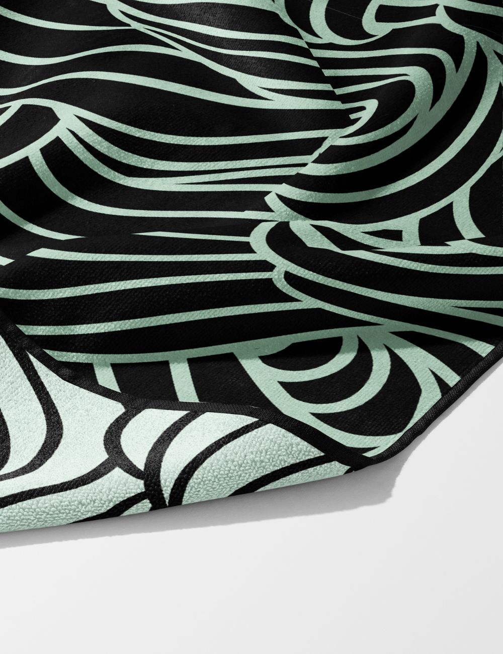 61 Swell Mint unisex gym towel – white background, zoomed in bottom right, corner folded to show reverse